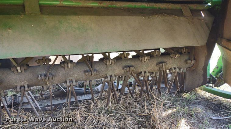 image for item DQ1672 2000 John Deere 945  swather / windrower