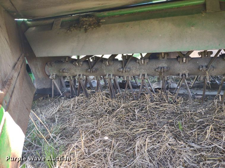 image for item DQ1672 2000 John Deere 945  swather / windrower