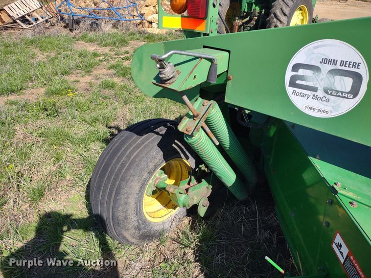 image for item DQ1672 2000 John Deere 945  swather / windrower