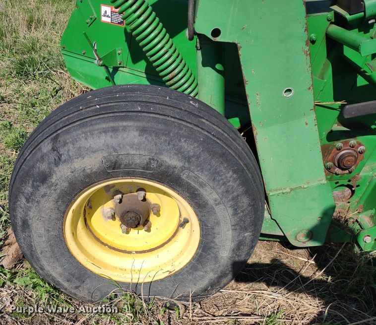 image for item DQ1672 2000 John Deere 945  swather / windrower