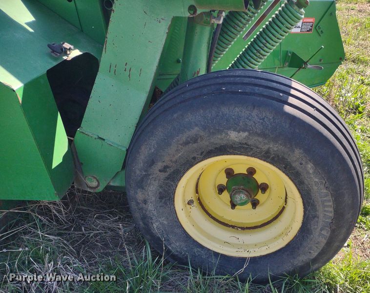 image for item DQ1672 2000 John Deere 945  swather / windrower