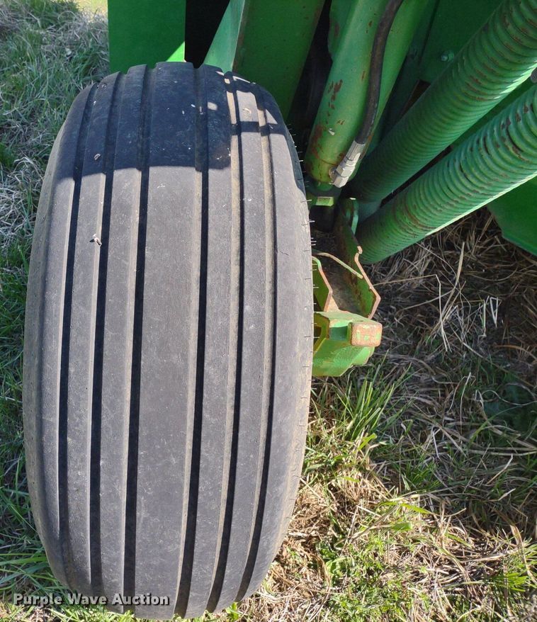 image for item DQ1672 2000 John Deere 945  swather / windrower