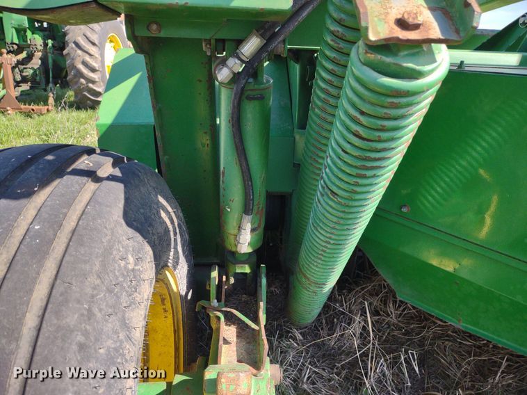 image for item DQ1672 2000 John Deere 945  swather / windrower