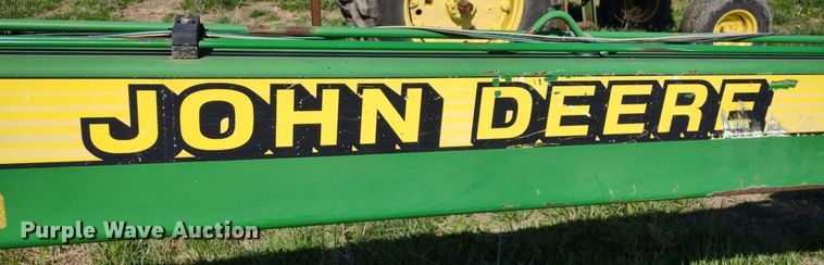 image for item DQ1672 2000 John Deere 945  swather / windrower