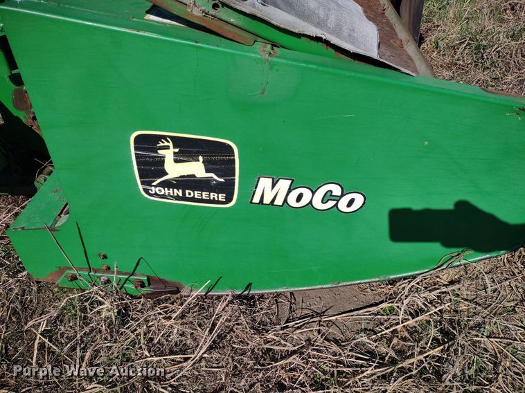 image for item DQ1672 2000 John Deere 945  swather / windrower