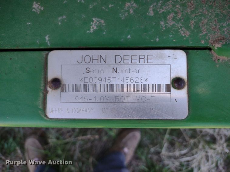 image for item DQ1672 2000 John Deere 945  swather / windrower
