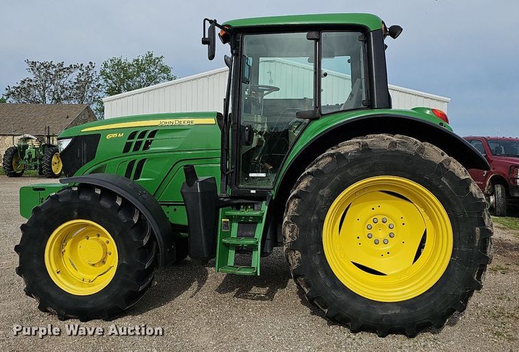 image for item MB9997 2014 John Deere 6115M  MFWD tractor