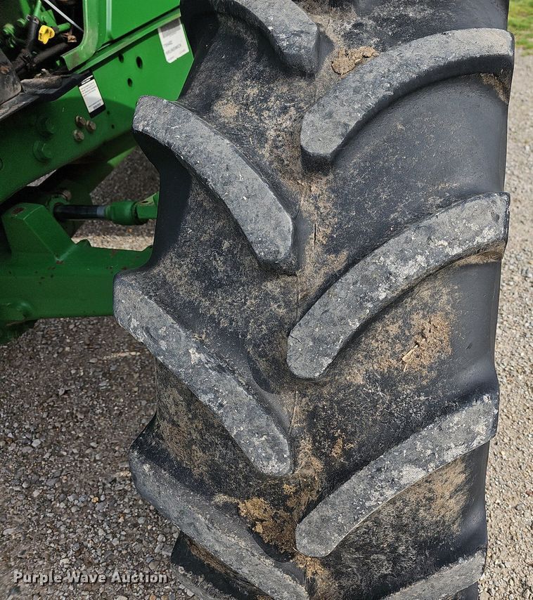 image for item MB9997 2014 John Deere 6115M  MFWD tractor