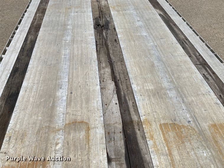 image for item HN9855 2012 Transcraft Benson AF53102-2-524  flatbed trailer