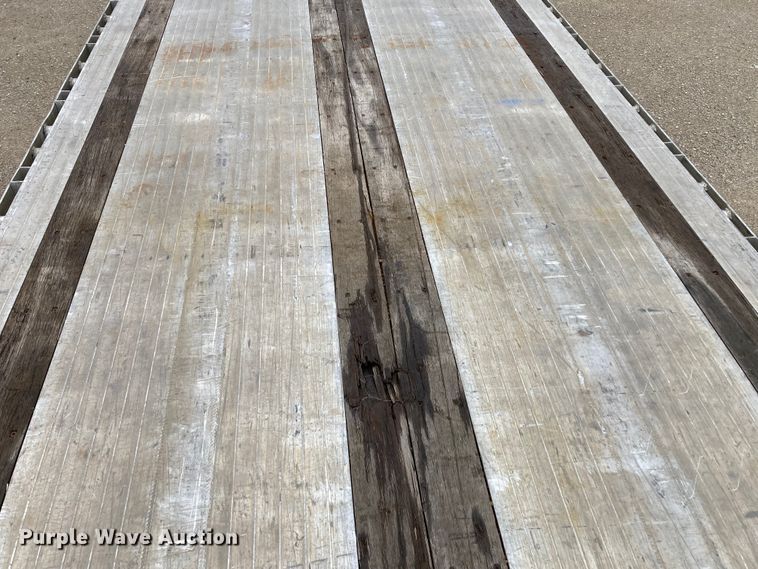 image for item HN9855 2012 Transcraft Benson AF53102-2-524  flatbed trailer