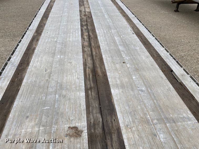 image for item HN9856 2012 Transcraft Benson AF53102-2-524  flatbed trailer