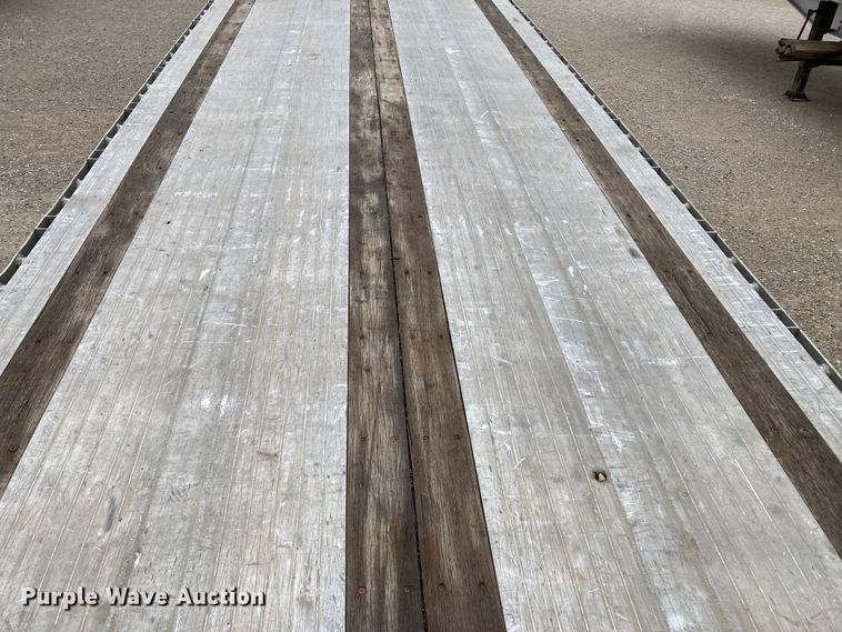 image for item HN9856 2012 Transcraft Benson AF53102-2-524  flatbed trailer