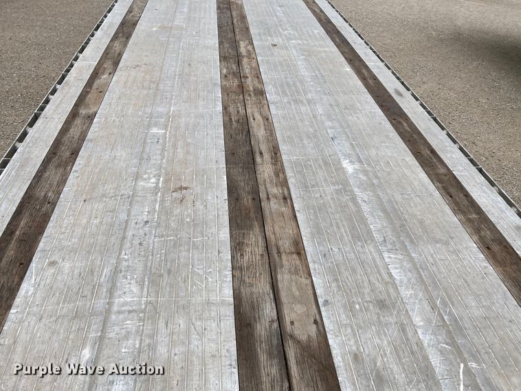 image for item HN9856 2012 Transcraft Benson AF53102-2-524  flatbed trailer