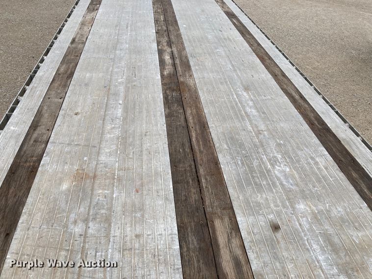 image for item HN9856 2012 Transcraft Benson AF53102-2-524  flatbed trailer