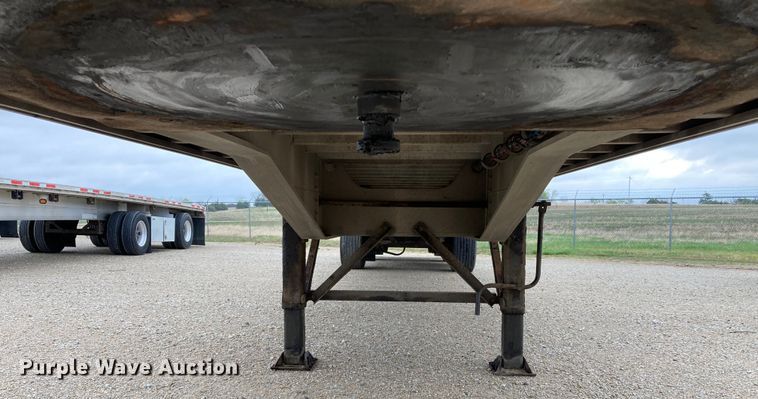 image for item HN9857 2013 Transcraft Benson AF53102-2-524  flatbed trailer