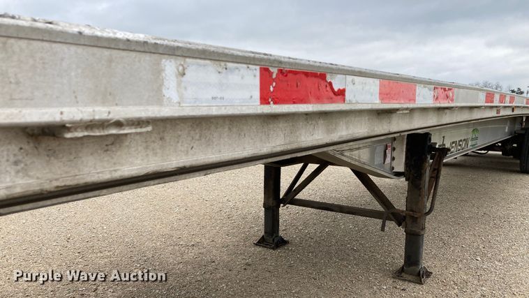 image for item HN9857 2013 Transcraft Benson AF53102-2-524  flatbed trailer
