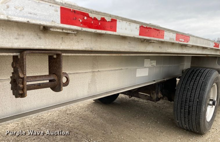 image for item HN9857 2013 Transcraft Benson AF53102-2-524  flatbed trailer