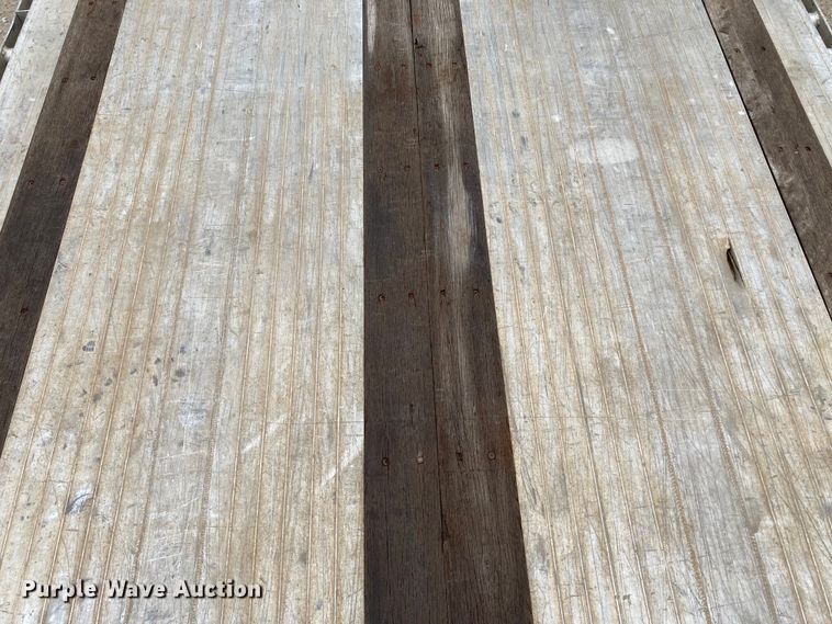 image for item HN9857 2013 Transcraft Benson AF53102-2-524  flatbed trailer