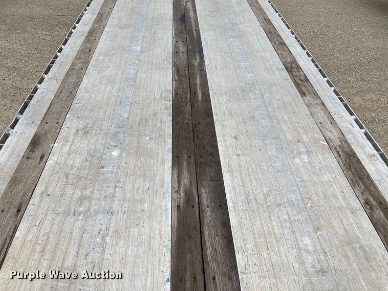image for item HN9857 2013 Transcraft Benson AF53102-2-524  flatbed trailer