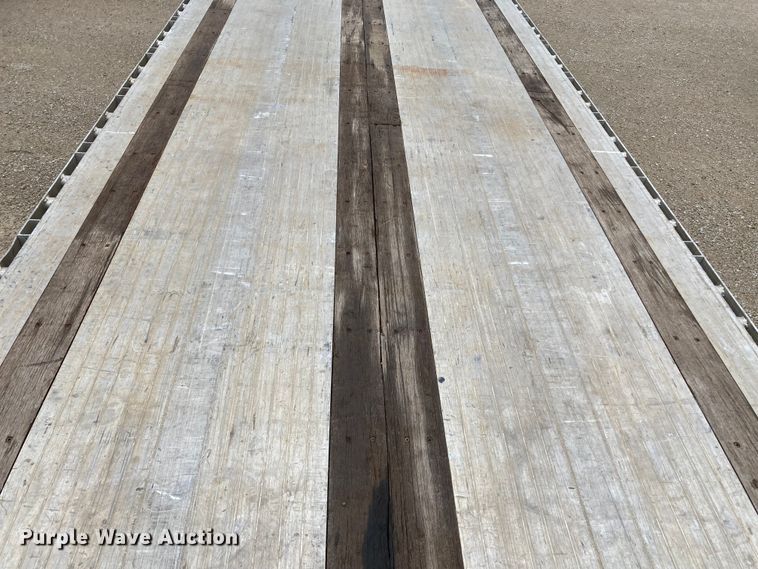 image for item HN9857 2013 Transcraft Benson AF53102-2-524  flatbed trailer