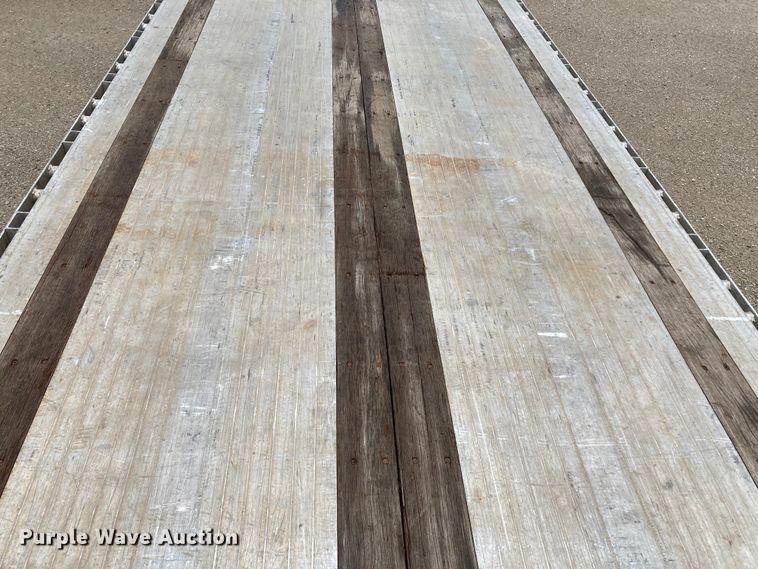 image for item HN9857 2013 Transcraft Benson AF53102-2-524  flatbed trailer