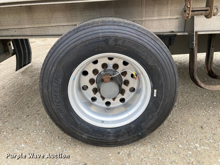 image for item HN9857 2013 Transcraft Benson AF53102-2-524  flatbed trailer