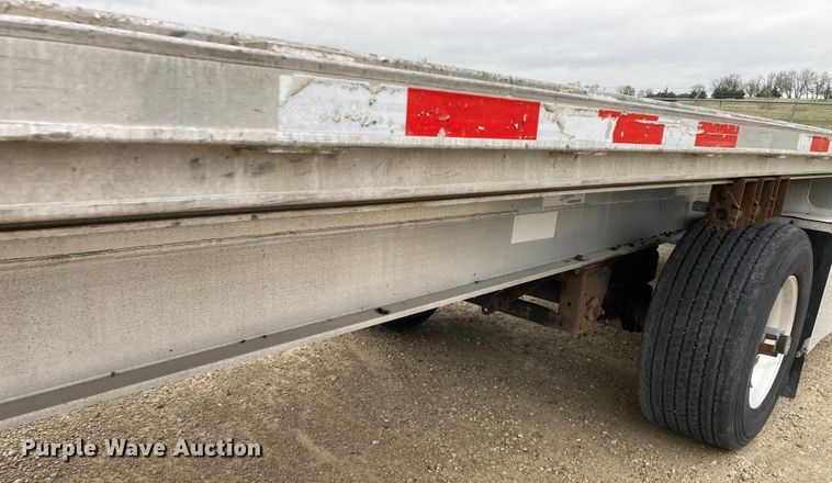 image for item HN9858 2013 Transcraft Benson AF53102-2-524  flatbed trailer