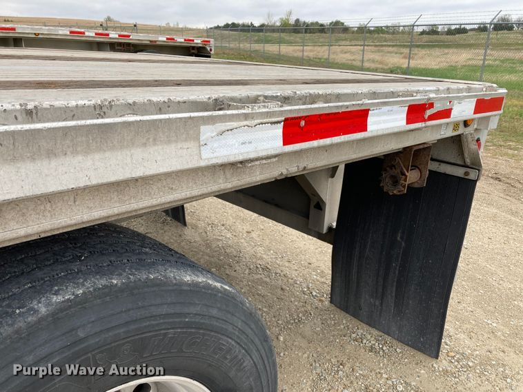 image for item HN9858 2013 Transcraft Benson AF53102-2-524  flatbed trailer