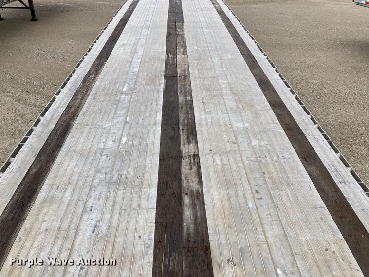 image for item HN9858 2013 Transcraft Benson AF53102-2-524  flatbed trailer