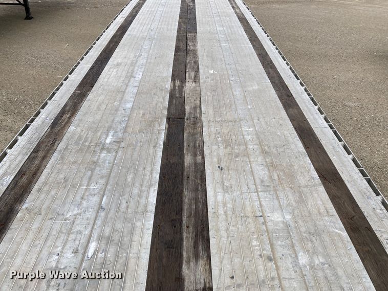 image for item HN9858 2013 Transcraft Benson AF53102-2-524  flatbed trailer