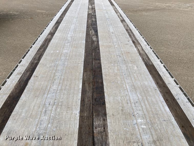 image for item HN9858 2013 Transcraft Benson AF53102-2-524  flatbed trailer