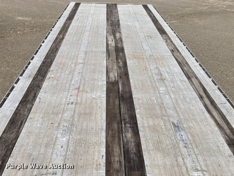 image for item HN9858 2013 Transcraft Benson AF53102-2-524  flatbed trailer