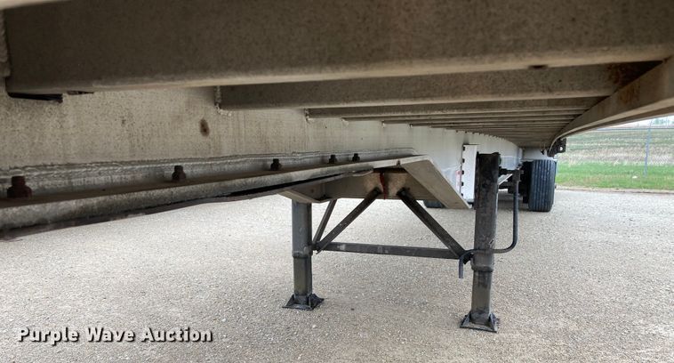 image for item HN9859 2013 Transcraft Benson AF53102-2-524  flatbed trailer