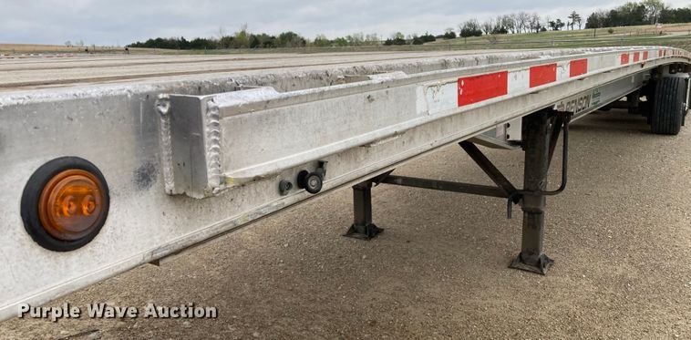 image for item HN9859 2013 Transcraft Benson AF53102-2-524  flatbed trailer