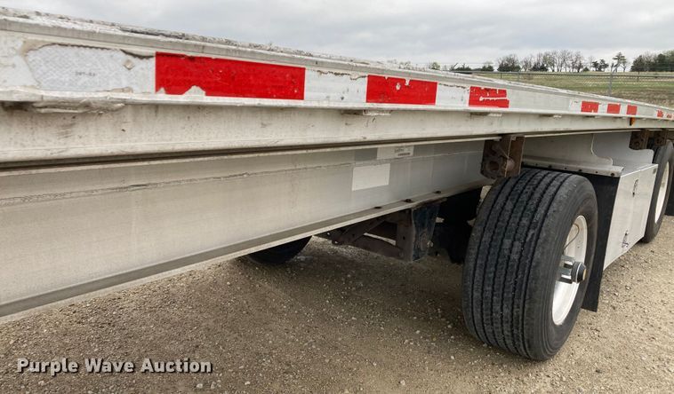 image for item HN9859 2013 Transcraft Benson AF53102-2-524  flatbed trailer