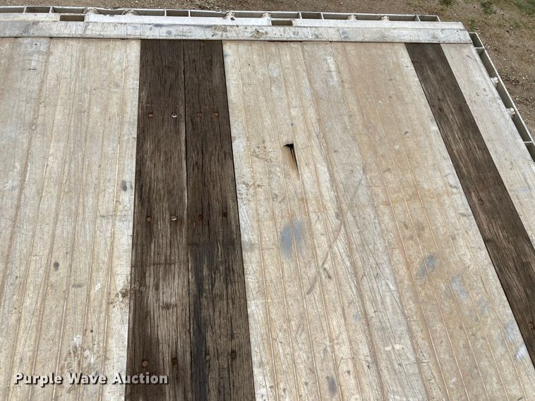 image for item HN9859 2013 Transcraft Benson AF53102-2-524  flatbed trailer