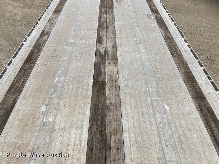 image for item HN9859 2013 Transcraft Benson AF53102-2-524  flatbed trailer