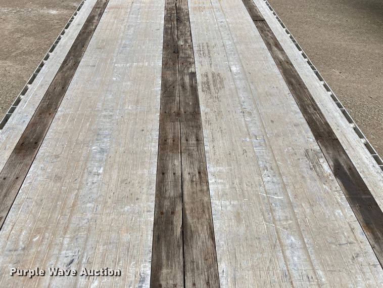 image for item HN9859 2013 Transcraft Benson AF53102-2-524  flatbed trailer