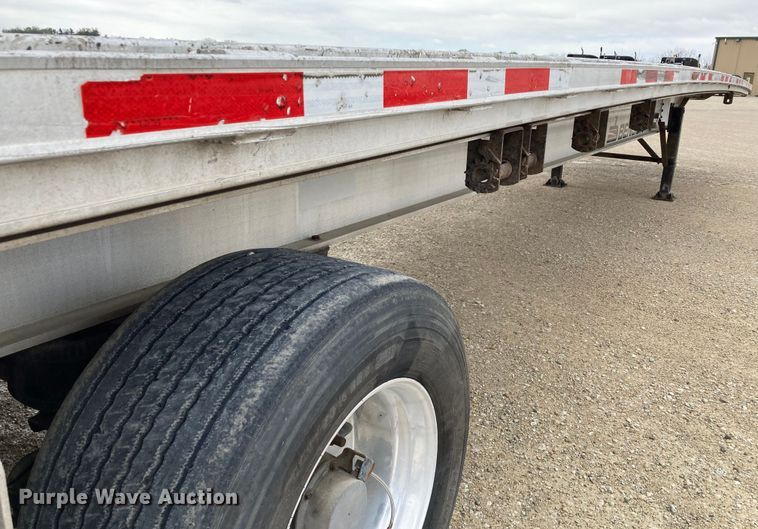 image for item HN9859 2013 Transcraft Benson AF53102-2-524  flatbed trailer