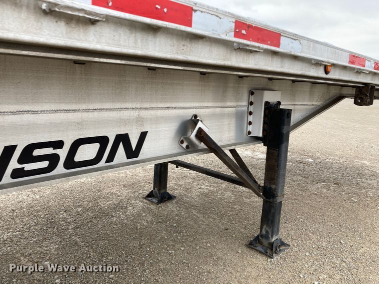 image for item HN9859 2013 Transcraft Benson AF53102-2-524  flatbed trailer