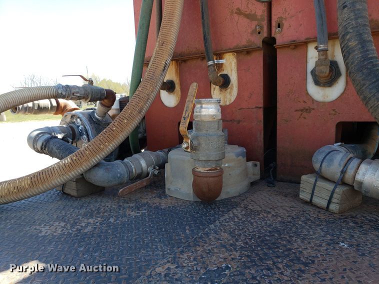 image for item LT9693 1995 Kenworth T300  flatbed truck with fluid mixing system