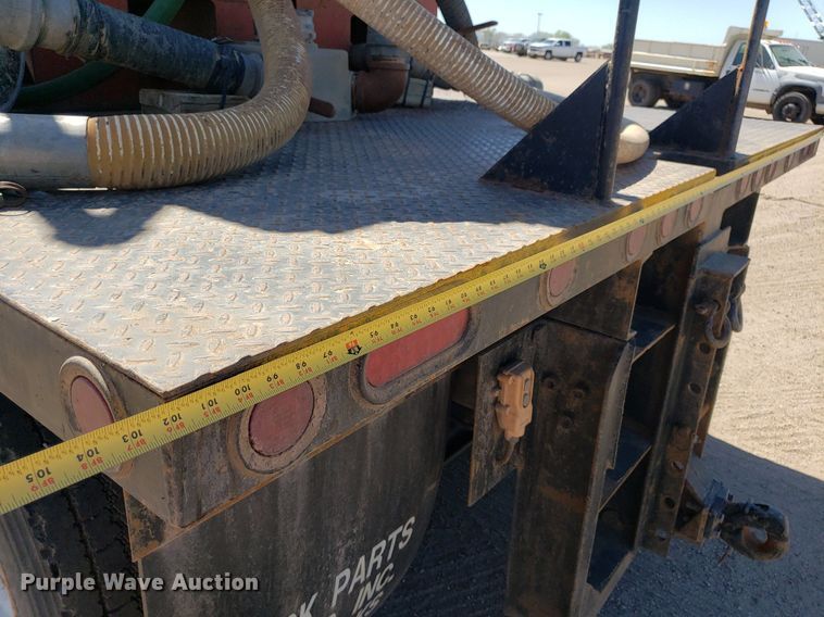 image for item LT9693 1995 Kenworth T300  flatbed truck with fluid mixing system