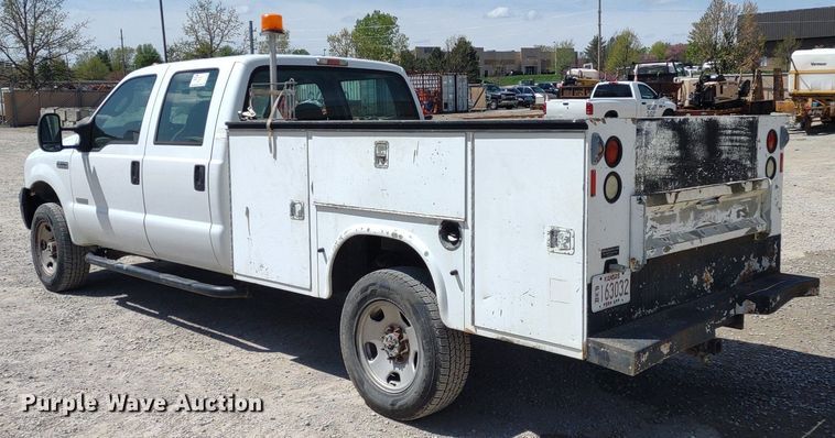 image for item DQ1700 2007 Ford F350 Super Duty XL  Crew Cab utility bed pickup truck