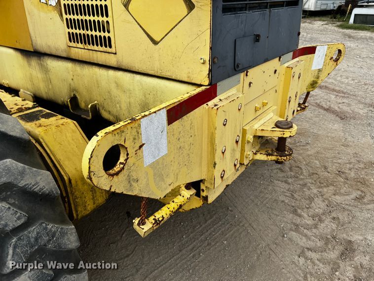 image for item DQ2037 2000 New Holland RG140  motor grader