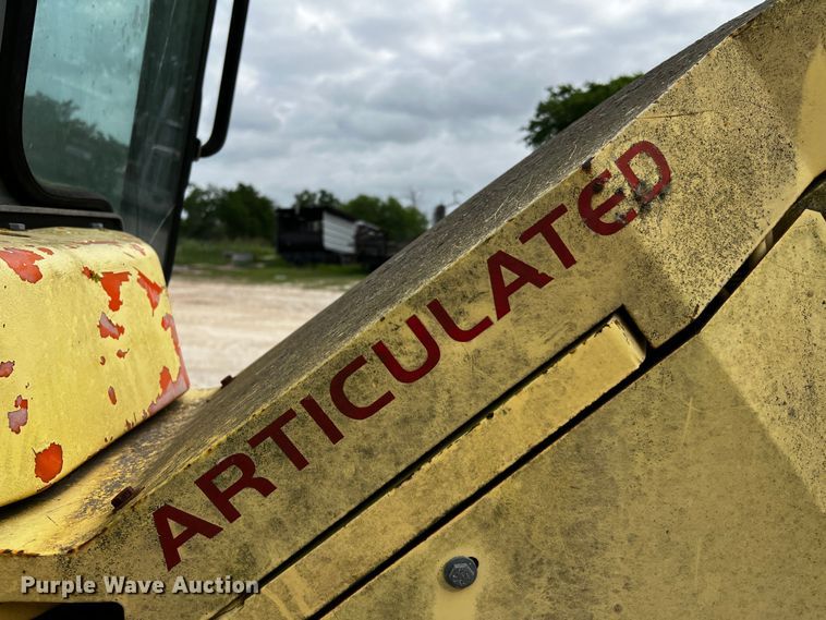 image for item DQ2037 2000 New Holland RG140  motor grader