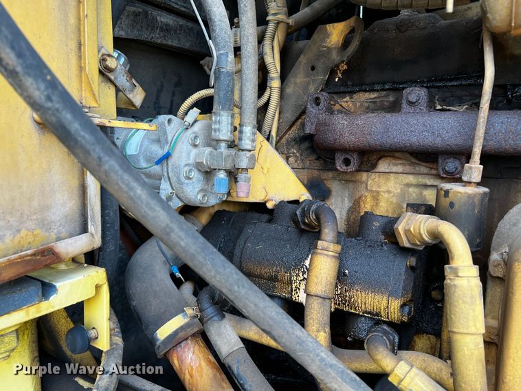 image for item DQ2037 2000 New Holland RG140  motor grader