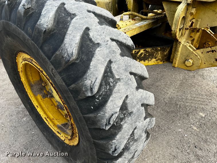 image for item DQ2037 2000 New Holland RG140  motor grader