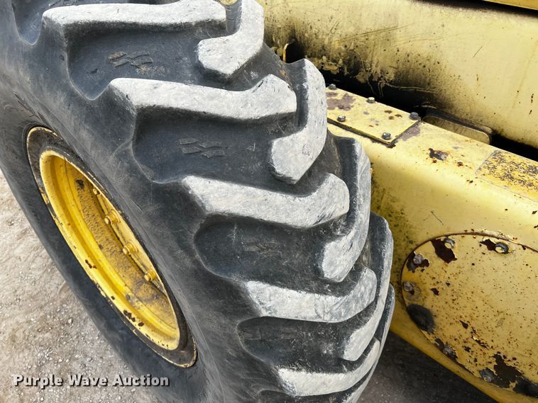 image for item DQ2037 2000 New Holland RG140  motor grader