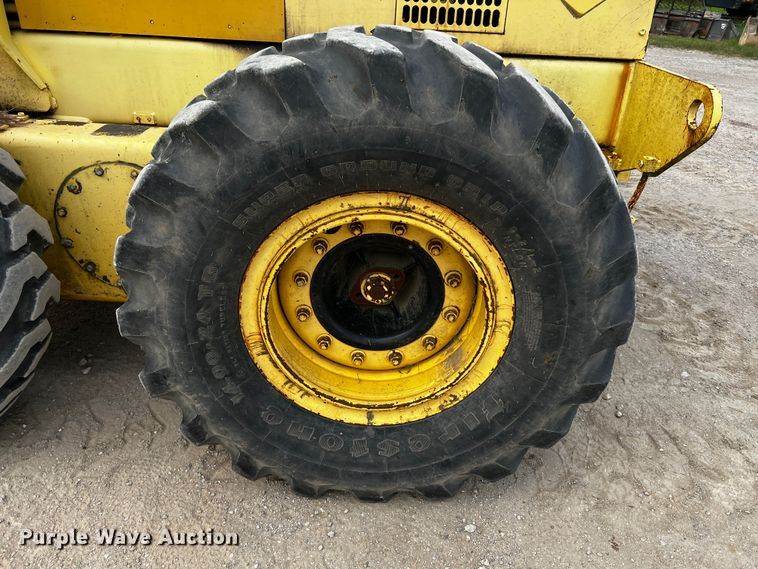 image for item DQ2037 2000 New Holland RG140  motor grader