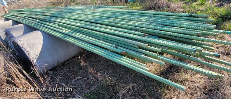image for item HP9729 Approximately 90 sticks of epoxy coated rebar